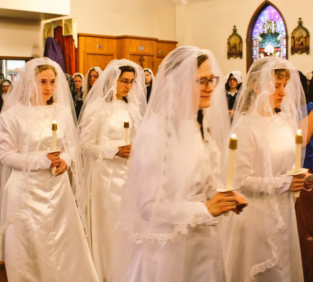 Candidates during a ceremony of religious reception.